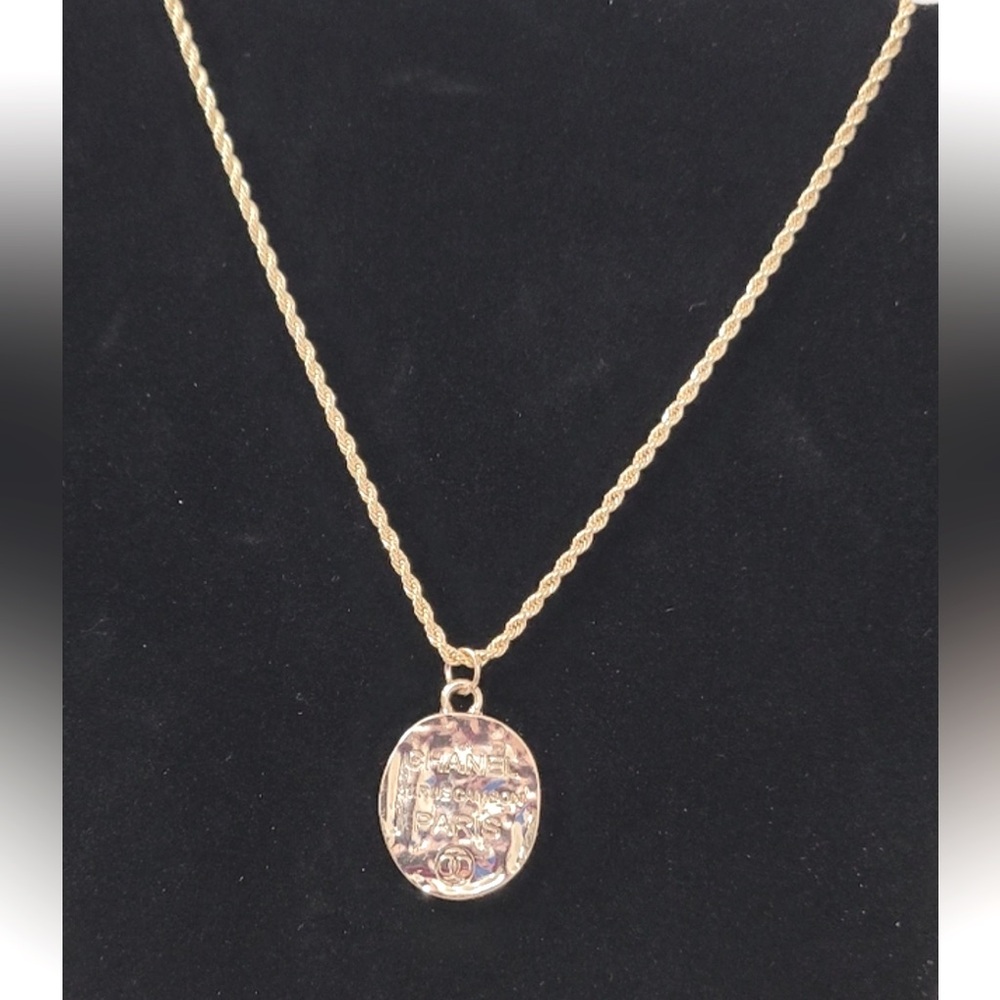 CHANEL Goldtone Rope Chain Necklace with Textured Oval Pendant